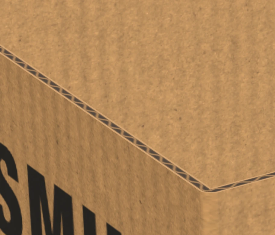 Flutes at the cut edge of a corrugated box
