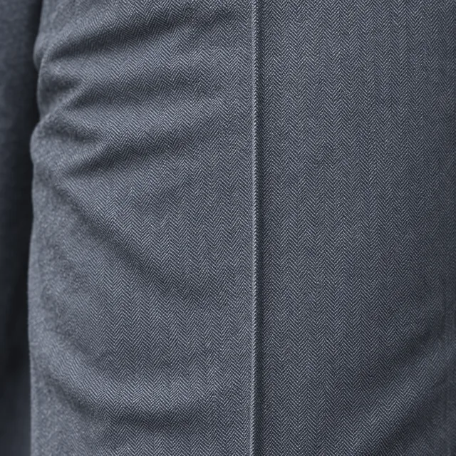 Close-up of herringbone trousers